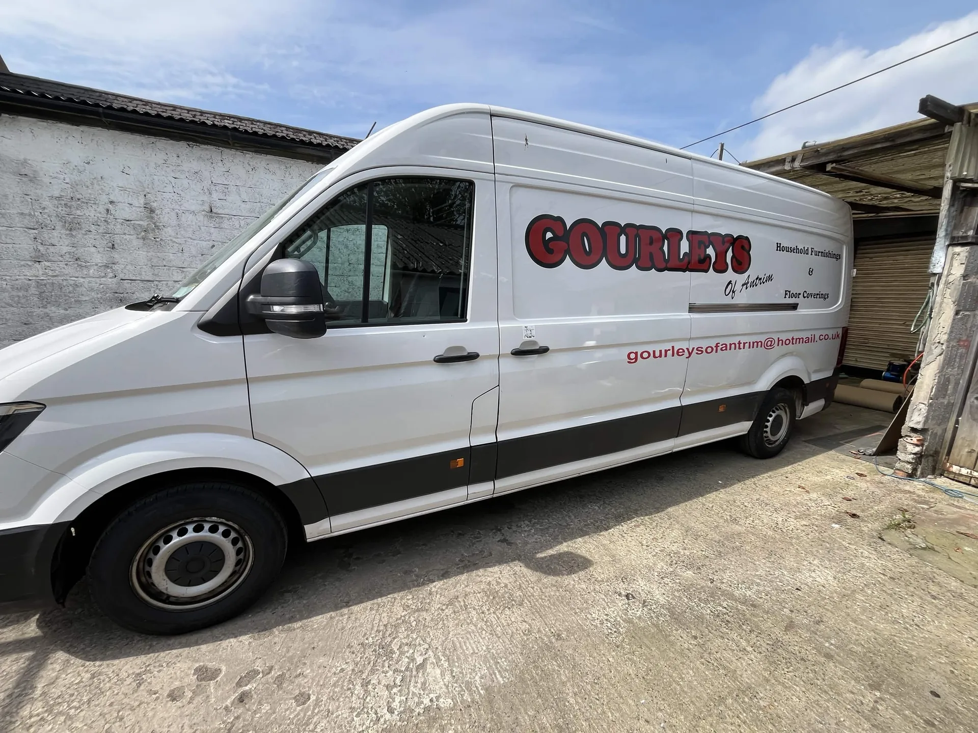 Gourleys branded carpet fitting van outside the premises