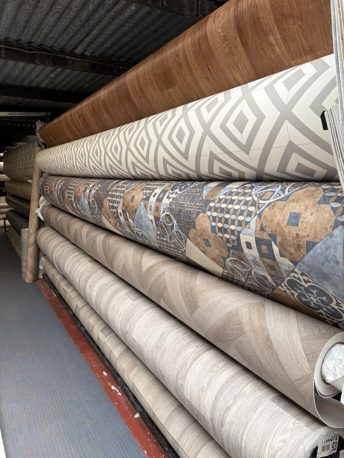 Patterned vinyl flooring rolls in the Antrim showroom